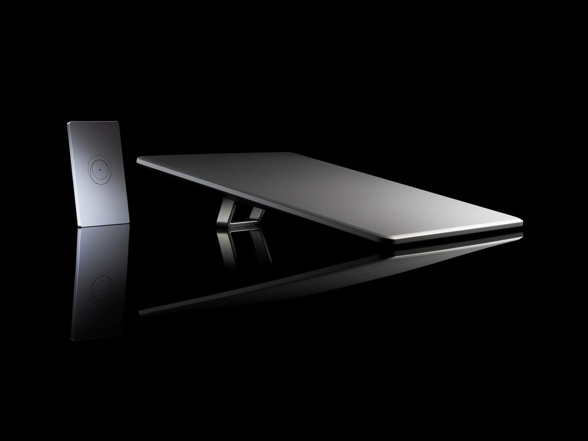 Starlink Standard Kit dish and router on a dark reflective surface